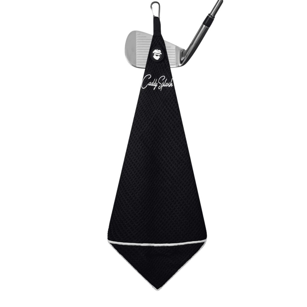Caddy Splash magnetic golf towel with ball pocket clipped to a club